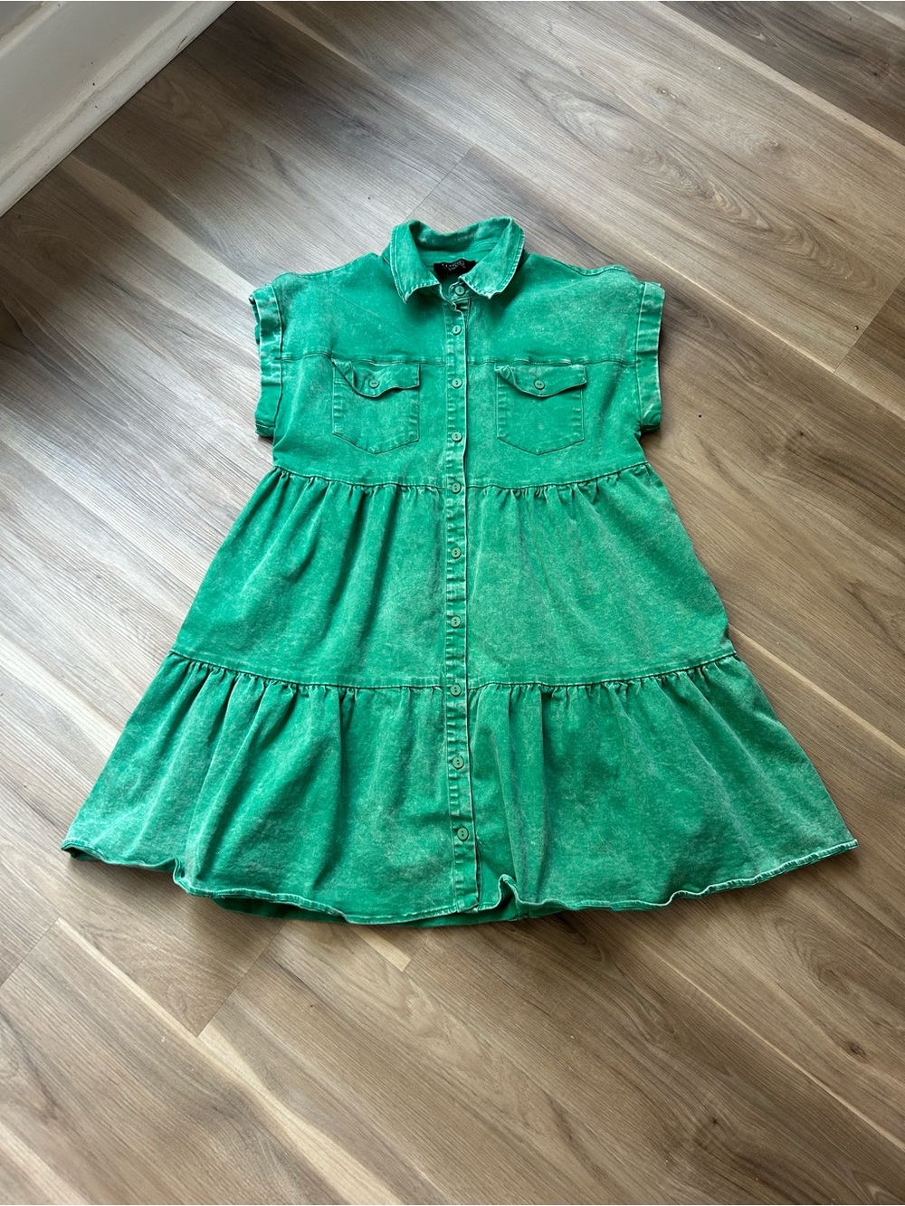 Green denim Flying Tomato dress with button-up front and ruffled hem